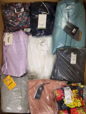 The photo shows a package with clothing in the category AW.