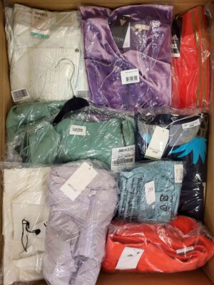 The photo shows a package with clothing in the category AW.