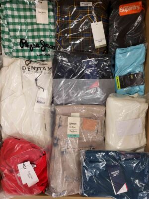 The photo shows a package with clothing in the category AW.