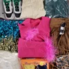 The photo shows a package with clothing in the category SN.
