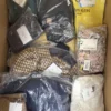 The photo shows a package with clothing in the category AP.