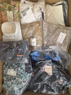 The photo shows a package with clothing in the category AP.