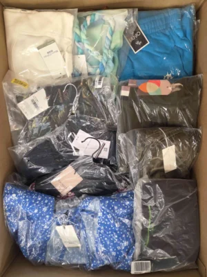 The photo shows a package with clothing in the category AP.