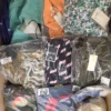 The photo shows a package with clothing in the category AP.
