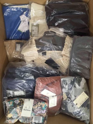 The photo shows a package with clothing in the category AP.