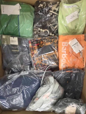 The photo shows a package with clothing in the category AP.