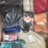 The photo shows a package with clothing in the category AP.