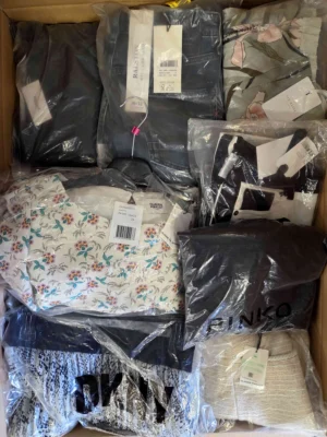 The photo shows a package with clothing in the category A.