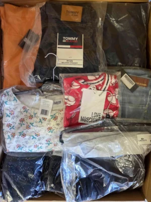 The photo shows a package with clothing in the category A.