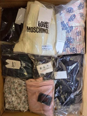 The photo shows a package with clothing in the category A.