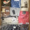 The photo shows a package with clothing in the category A.