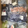 The photo shows a package with clothing in the category A.