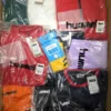 The photo shows a package with clothing in the category H.