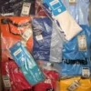 The photo shows a package with clothing in the category H.