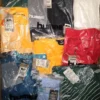The photo shows a package with clothing in the category H.