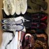 The photo shows a package with footwear in the category SH.