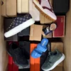 The photo shows a package with footwear in the category AS.