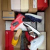 The photo shows a package with footwear in the category AS.