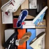 The photo shows a package with footwear in the category AS.