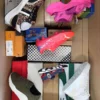 The photo shows a package with footwear in the category AS.