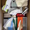 The photo shows a package with footwear in the category AS.