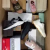 The photo shows a package with footwear in the category AS.