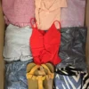 The photo shows a package with clothing in the category BSN.