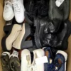 The photo shows a package with footwear in the category SH.
