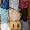 The photo shows a package with clothing in the category BSN.