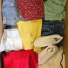 The photo shows a package with clothing in the category BSN.