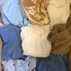 The photo shows a package with clothing in the category BSN.
