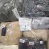 The photo shows a package with clothing in the category D.