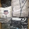 The photo shows a package with clothing in the category D.