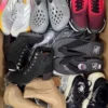 The photo shows a package with footwear in the category CSU.