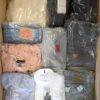 The photo shows a package with clothing in the category D.