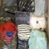 D1509 2 The photo shows a package with clothing in the category D.