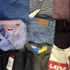 The photo shows a package with clothing in the category U.