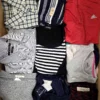 The photo shows a package with clothing in the category U.