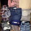 The photo shows a package with clothing in the category U.