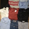 The photo shows a package with clothing in the category U.