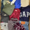 The photo shows a package with clothing in the category U.
