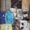 The photo shows a package with clothing in the category B.
