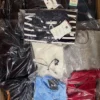 The photo shows a package with clothing in the category B.