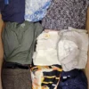 The photo shows a package with clothing in the category U.