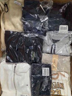 The photo shows a package with clothing in the category B.