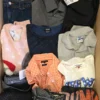 The photo shows a package with clothing in the category U.