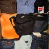 The photo shows a package with clothing in the category U.