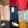The photo shows a package with clothing in the category U.