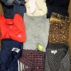 The photo shows a package with clothing in the category U.