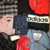 The photo shows a package with clothing in the category U.